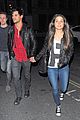 taylor lautner marie avgeropoulos matching jackets london 10